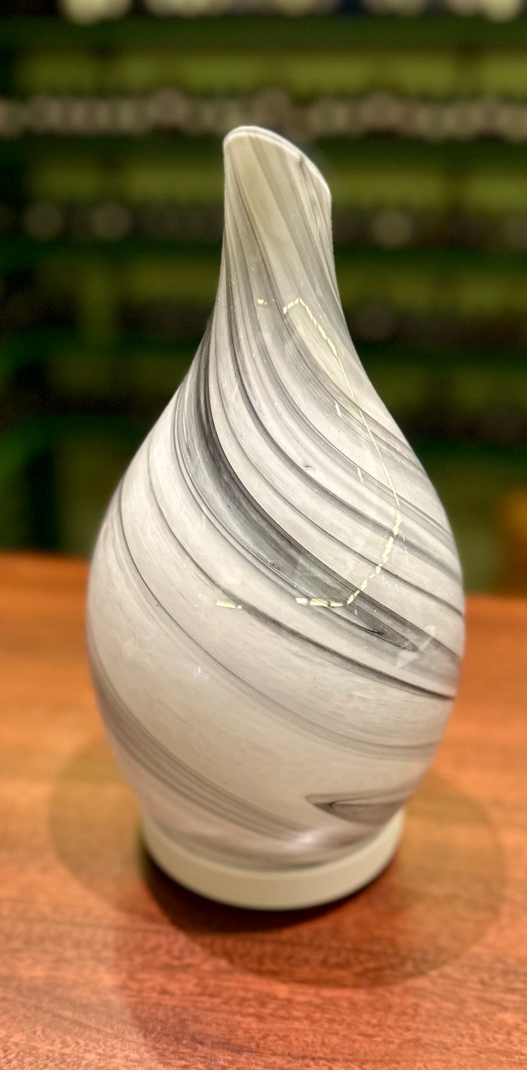 Rotating glass diffuser