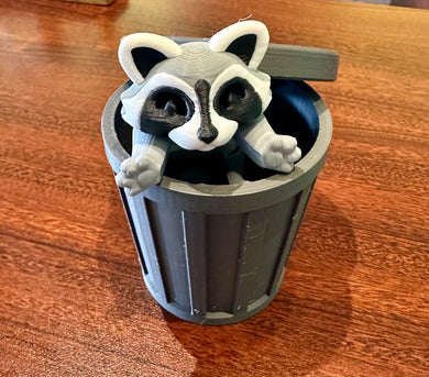 Raccoon in a trash can